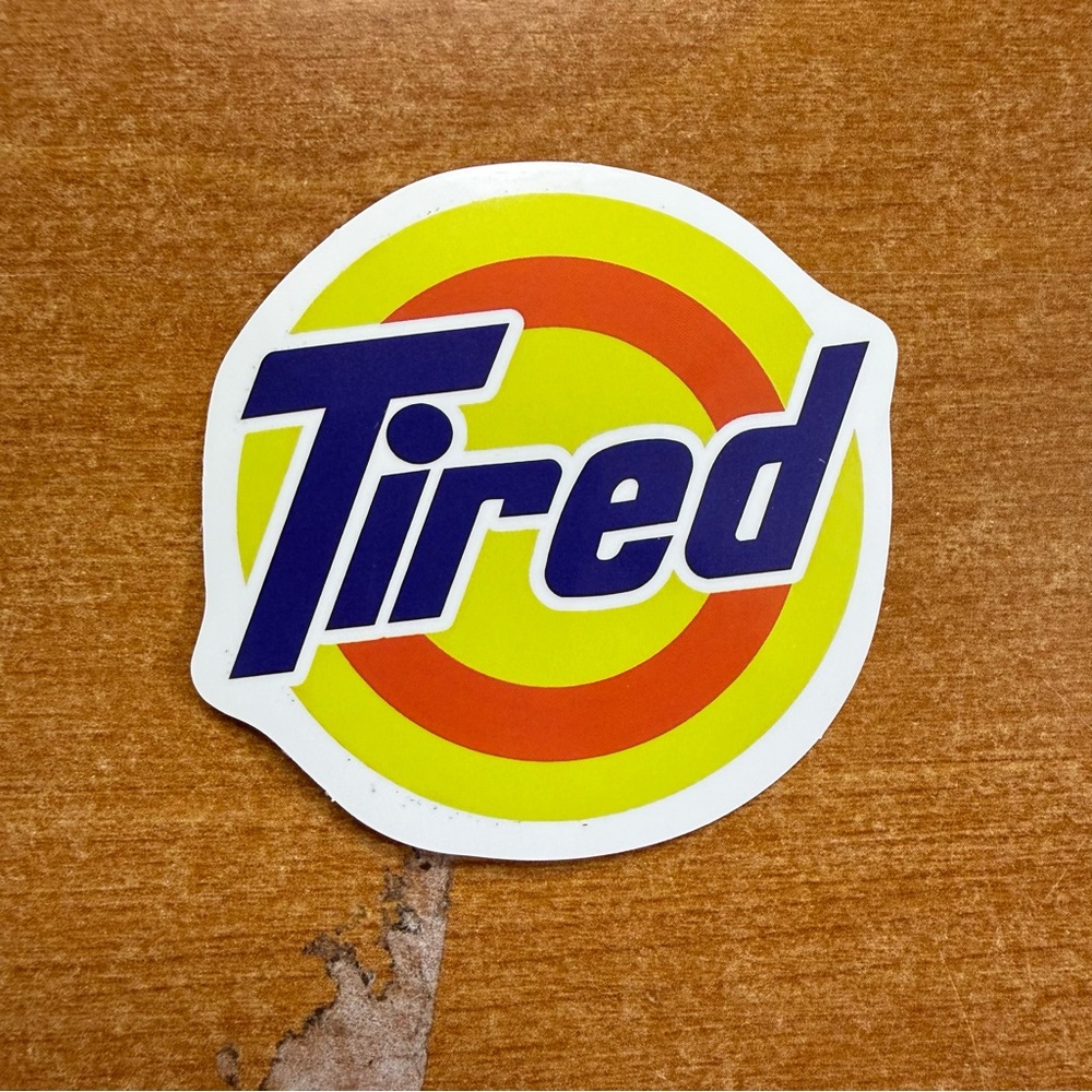 Tired Logo Sticker‎